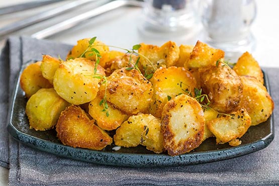 Crispy roasted potatoes . Perfect Crispy Roast Potatoes