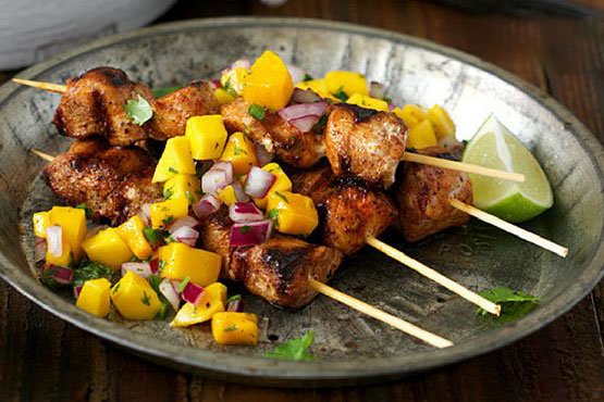 Recipes with mango . Ayesha Curry's Jerk Rubbed Chicken Skewers with Mango Salsa
